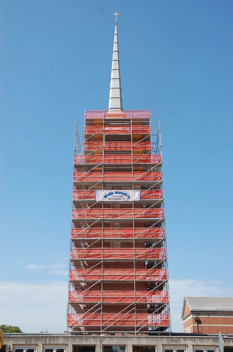 Scaffolding around a church steeple during restoration