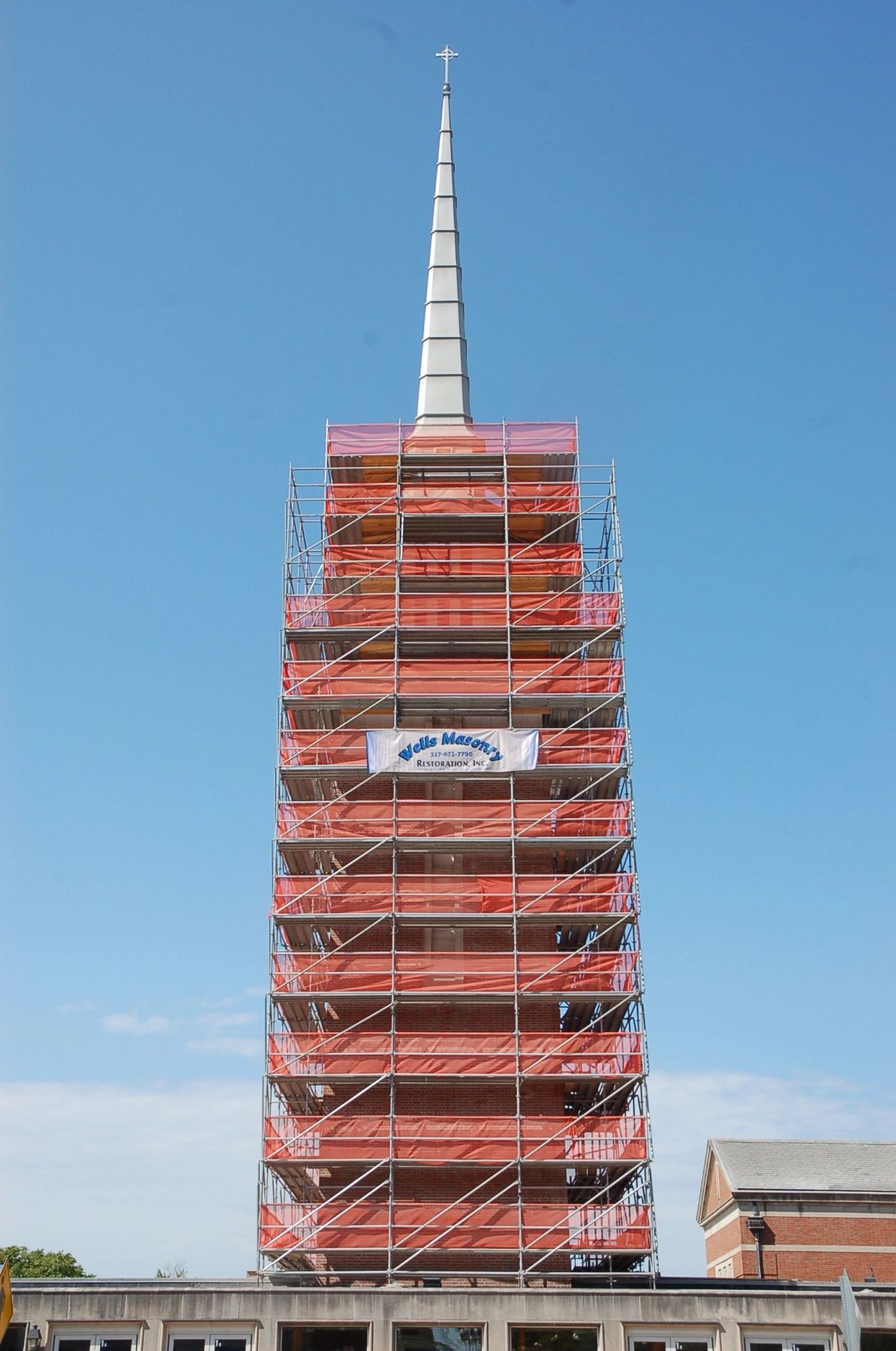 Scaffolding around a church steeple during restoration